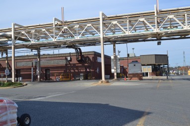 An above ground piping system connects key process and utilities across the site.